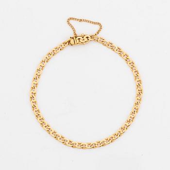 18K gold bracelet.