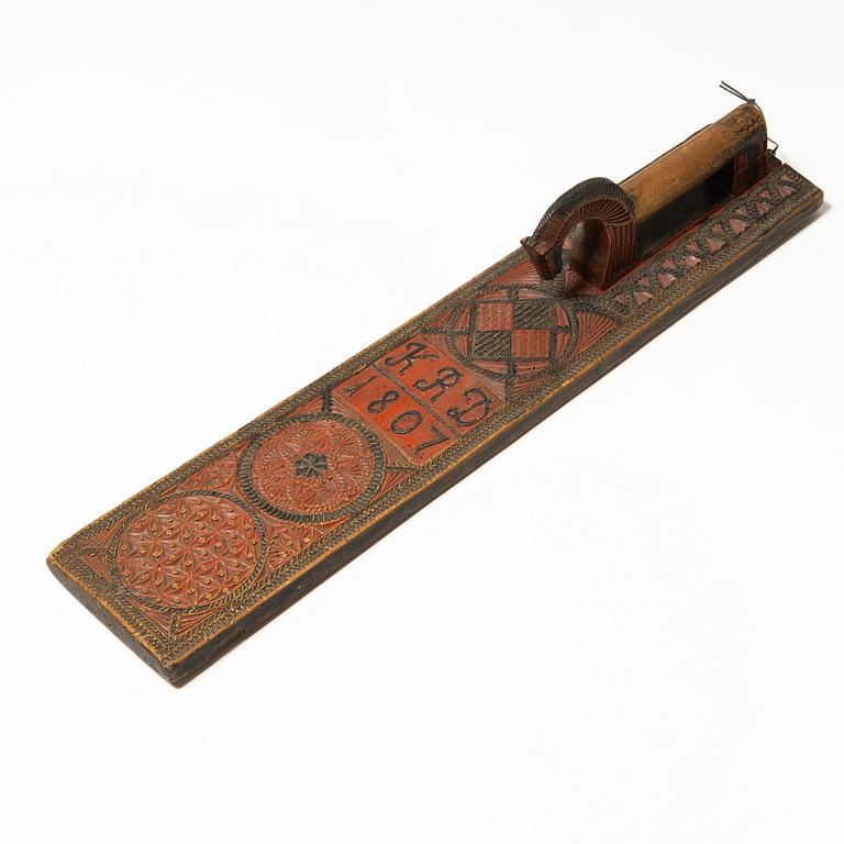 A painted wooden mangle board, Southern Sweden, dated 1807.