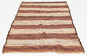 A Persian Kilim rug, c. 300 x 135 cm.