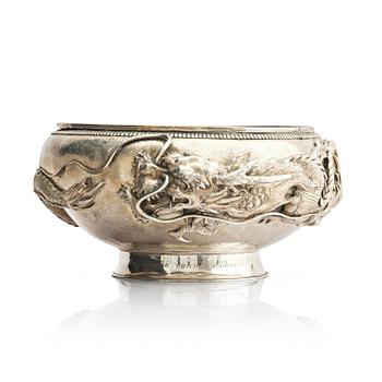 1265. A Chinese double walled 'dragon' silver bowl, Shanghai, around 1900.