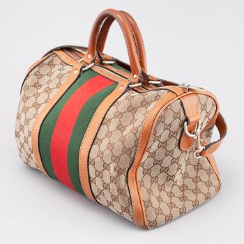 GUCCI, a bag.