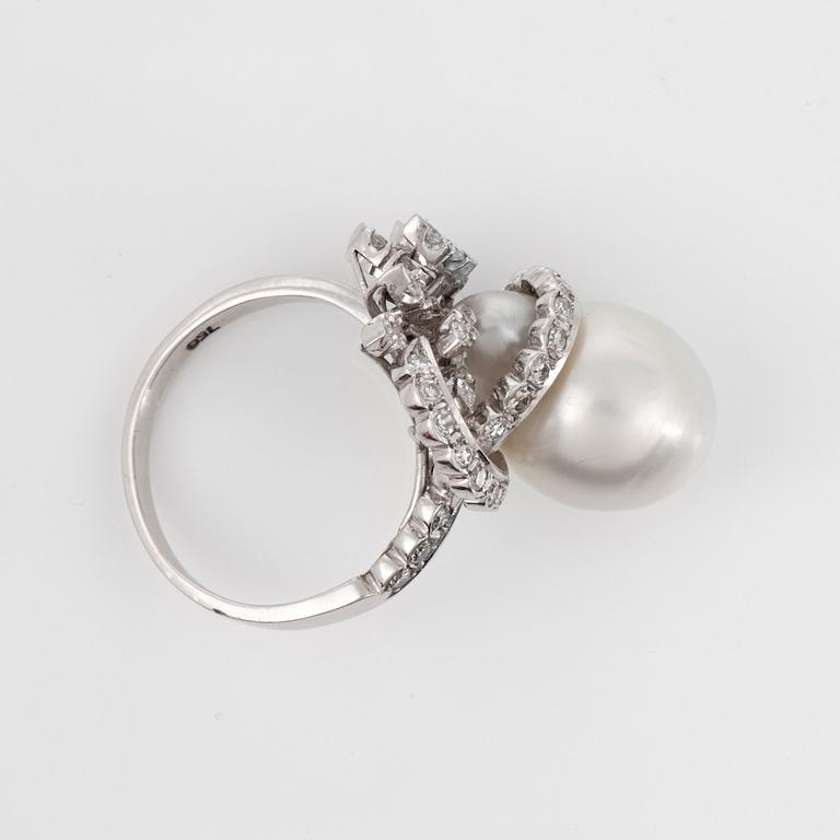 A cultured South Sea pearl and brilliant-cut diamond ring.