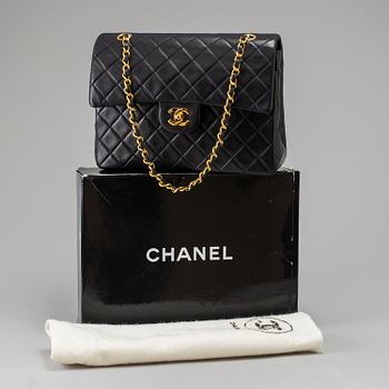 A "Double Flap bag" by Chanel.