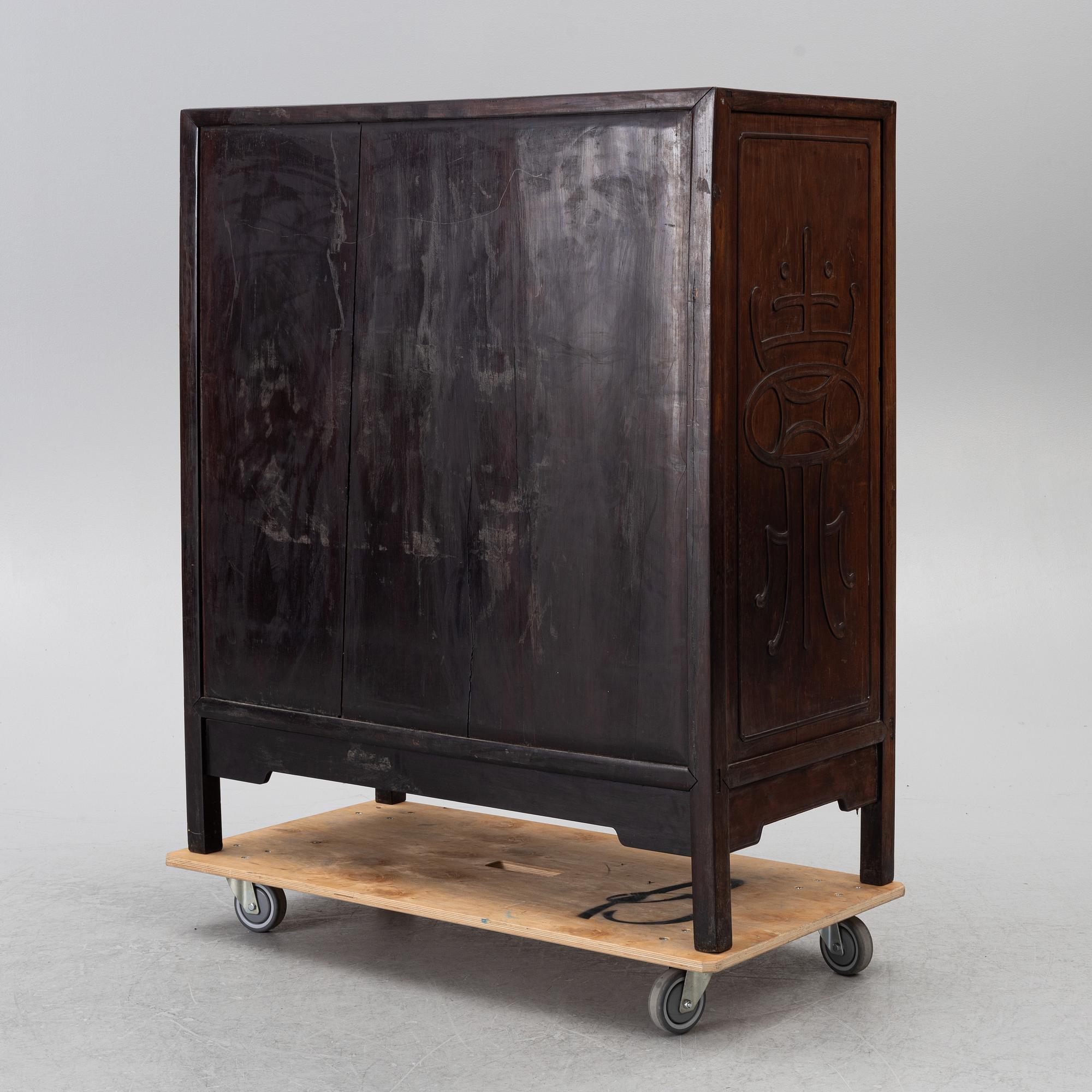 A hardwood cabinet, China, 20th century.