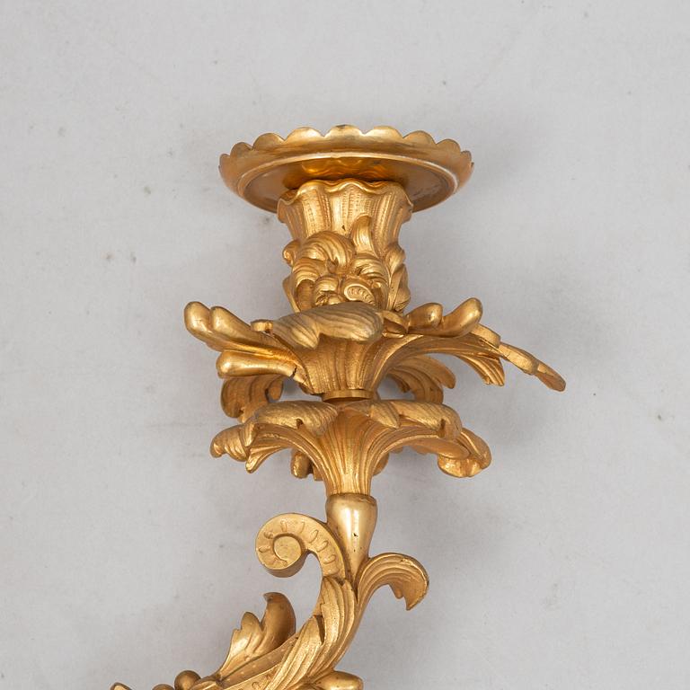 A pair of Louis XV sconces, early 20th century.