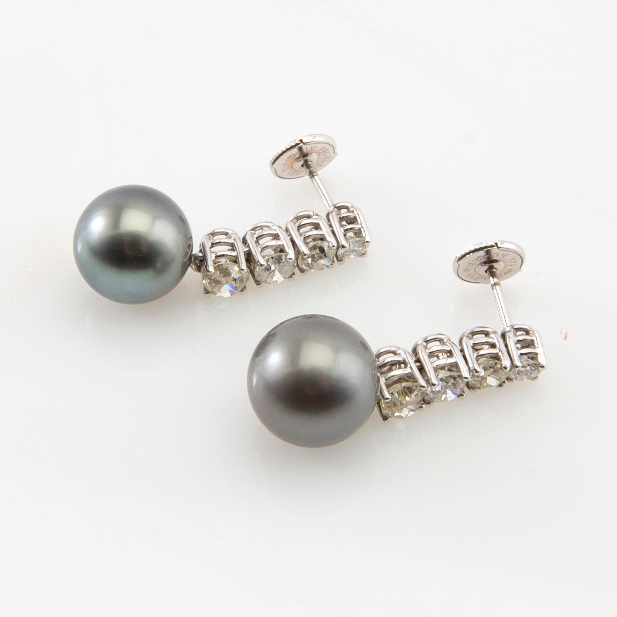 Earrings, a pair of 18K white gold with diamonds and cultured pearls.