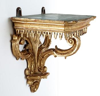 A 19th century Rococo style console.