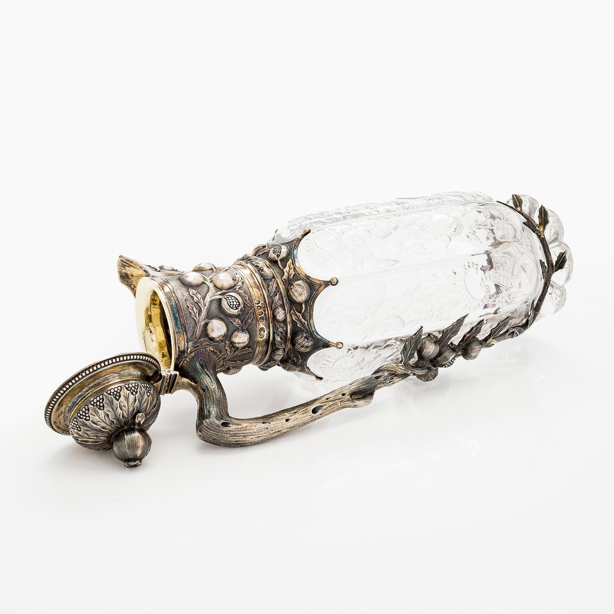 A silver mounted glass ewer, Elkington & Co, London 1884.