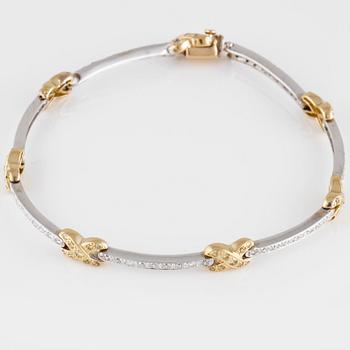 ARMBAND, 14K guld och vitguld med briljantslipade vita och gula diamanter ca 1.30 ct.  Vikt 12,7 gram.