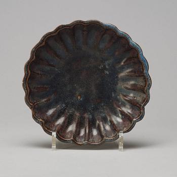 A brown and blue glazed dish, South East Asia, 19th Century or older.