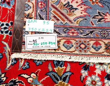 A Kashan carpet, c. 350 x 224 cm.