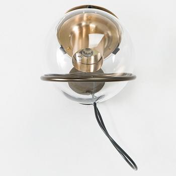 Joe Colombo, a 21st century 'The Globe 727' wall light, for Oluce.