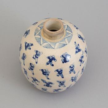 A blue and white porcelain jar, circa 1900.