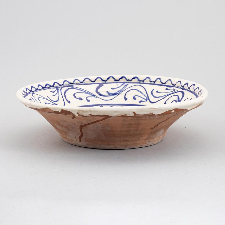 Three faience bowls, early 20th century.