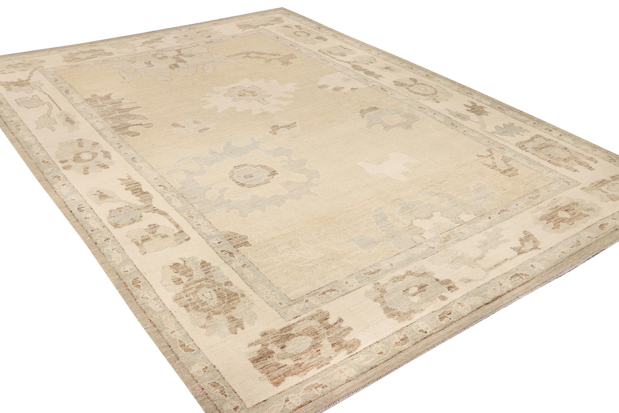 An Ushak design carpet, c. 442 x 317 cm.