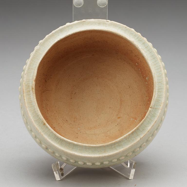 A pale celadon glazed tripod censer, Yuan dynasty (1280-1367).