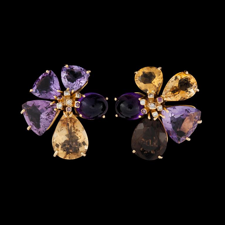 A pair of quartz and diamond tot. app. 0.20 ct earrings.