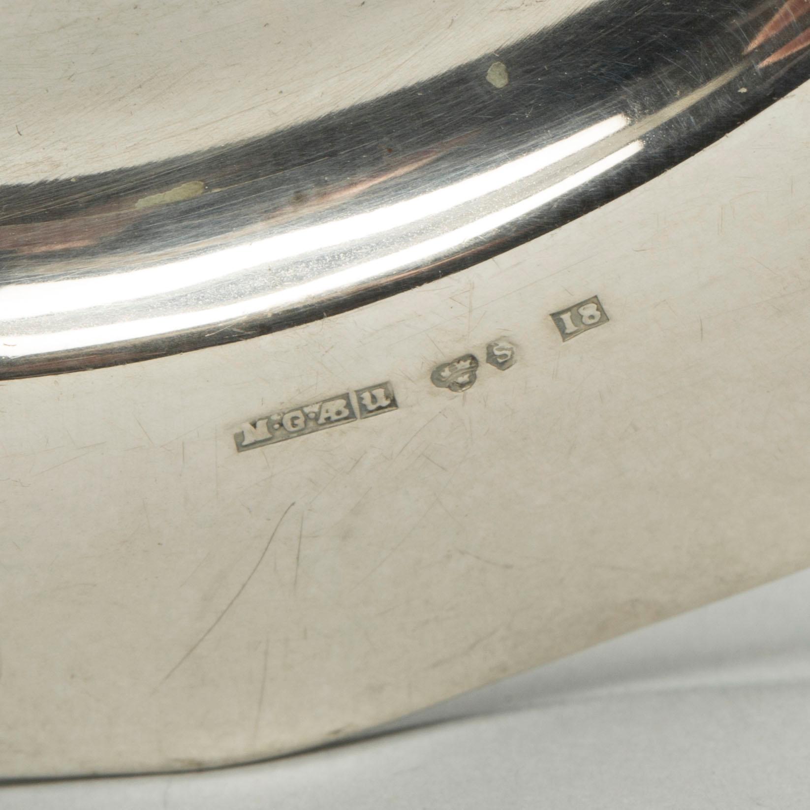 UNDERLÄGG, 15 st samt BÄGARE, silver, 1930-tal. Totalt ca 500 gram.