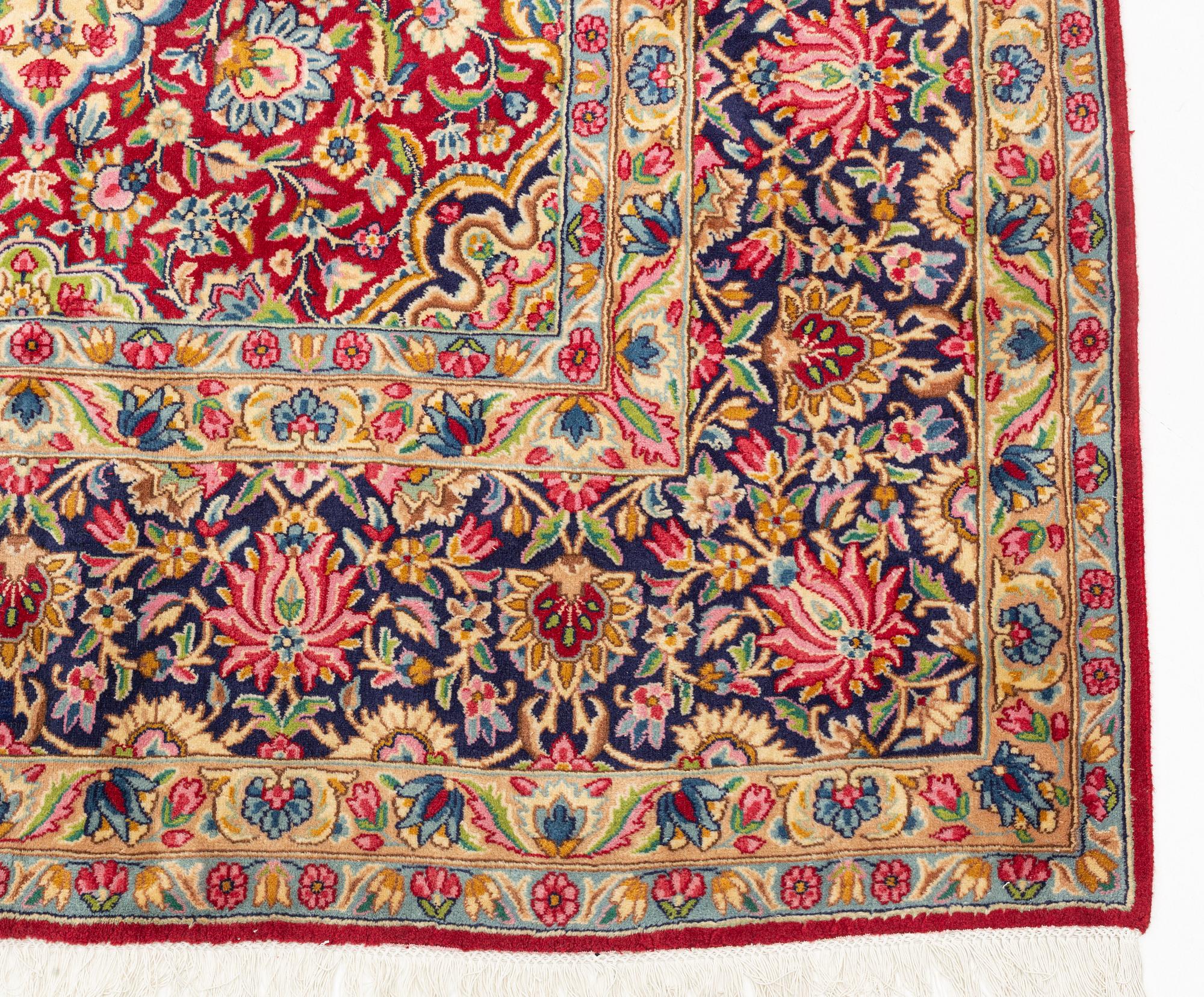 A Kerman carpet, 438 x 298 cm.