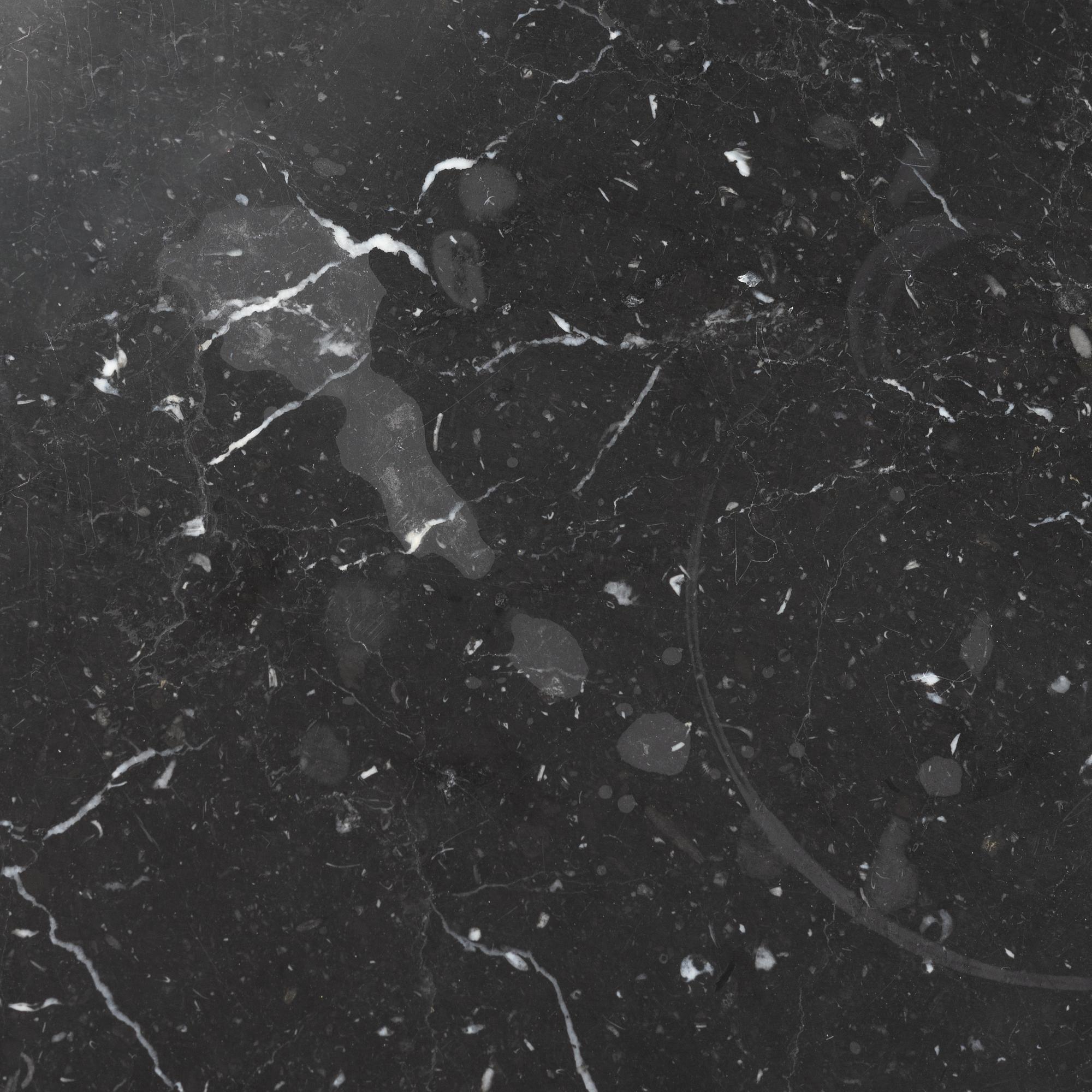 Louise Roe, a 'Roundabout' dining table with marble top.