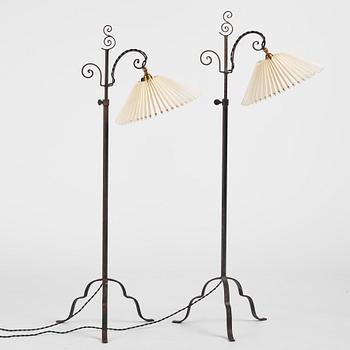 Harald Notini, a pair of wrought iron floor lamps, model "15101", Arvid Böhlmarks Lampfabrik, 1930s.