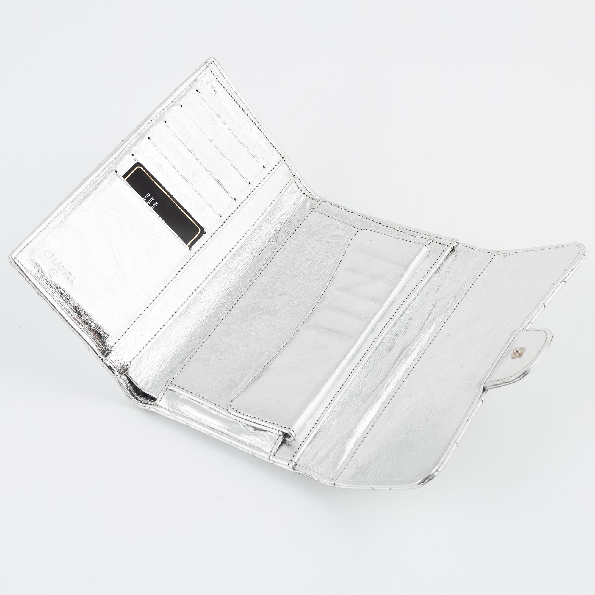 Chanel, a quilted silver leather wallet, 2006-08.