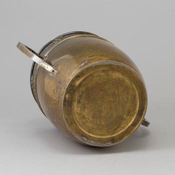 A brass jugend-style champagne cooler from early 21 st century.