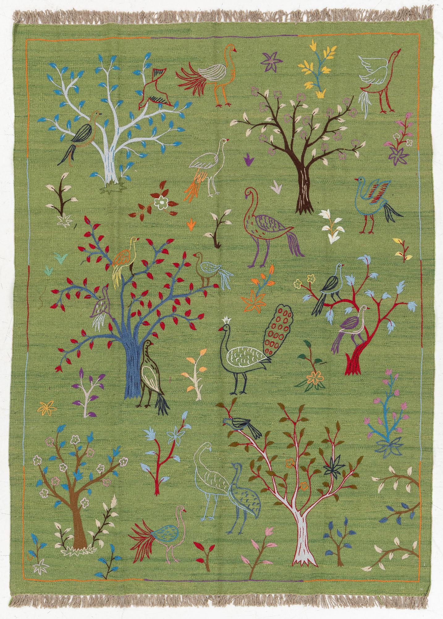 A hand-embroidered Kilim rug, c. 200 x 150 cm.