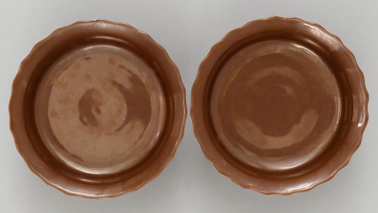 A pair of cappuciner glazed tazzas, China, with Qianlong seal mark.