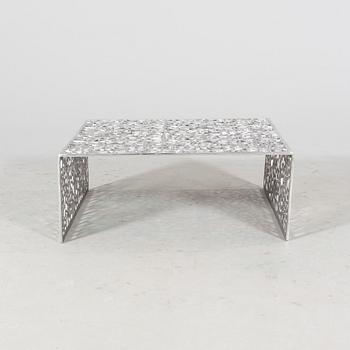 A 21st century aluminium coffee table.