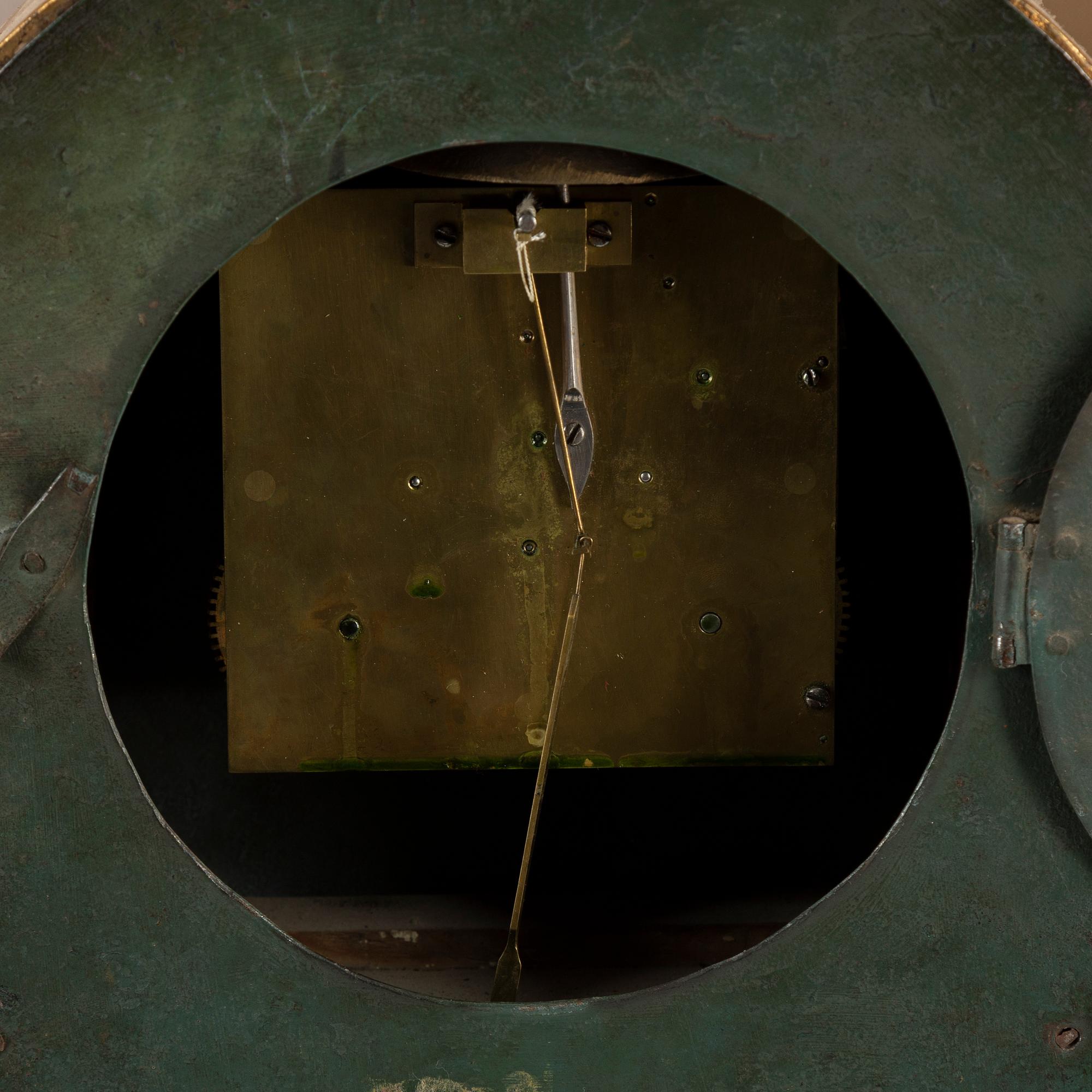 A late Empire wall clock by E. Engelbrechten.