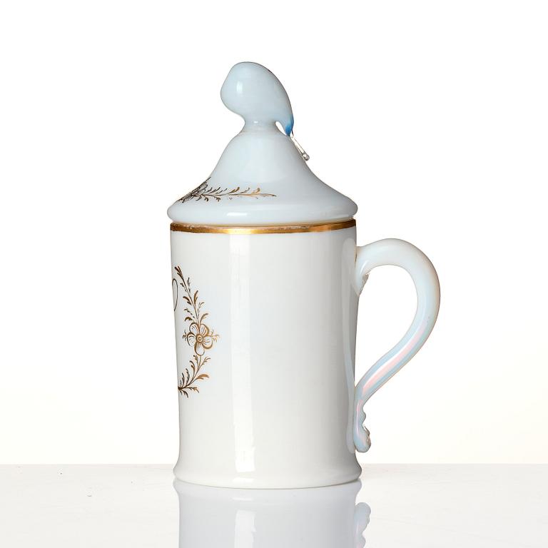 A white glass tankard with cover, possibly Strömbäck, circa 1800. Monogram LL.