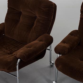 TWO 1970`S ARMCHAIRS.