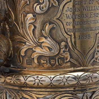 An English 19th century silver-gilt and glass wine-jug, marked Hunt & Roskell Late Storr & Mortimer, London 1895.