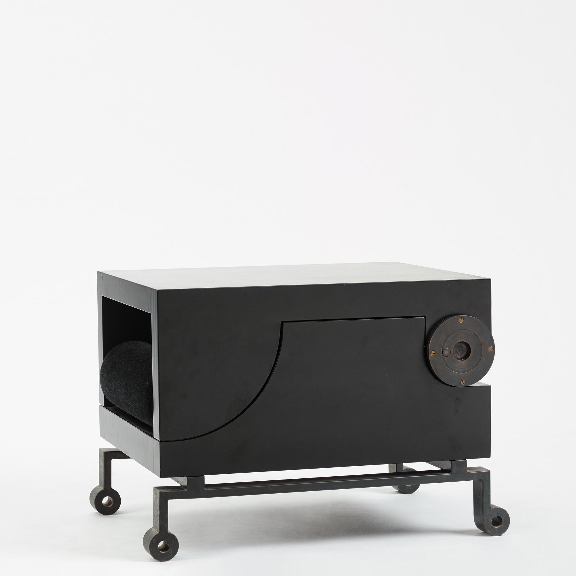 Alexander H Damsbo & Henrik Ingemann Nielsen, a "HC-Andersen Chair" armchair/table, ed. 3/49, Källemo, post 2005.