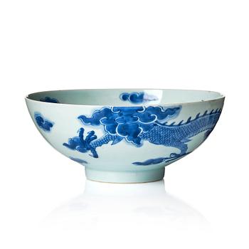 951. A blue and white four clawed  dragon bowl, Qing dynasty, 18th Century.