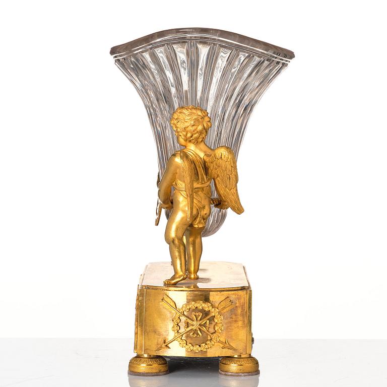 An Empire gilded bronze and glass centre piece, first part of the 19th century.