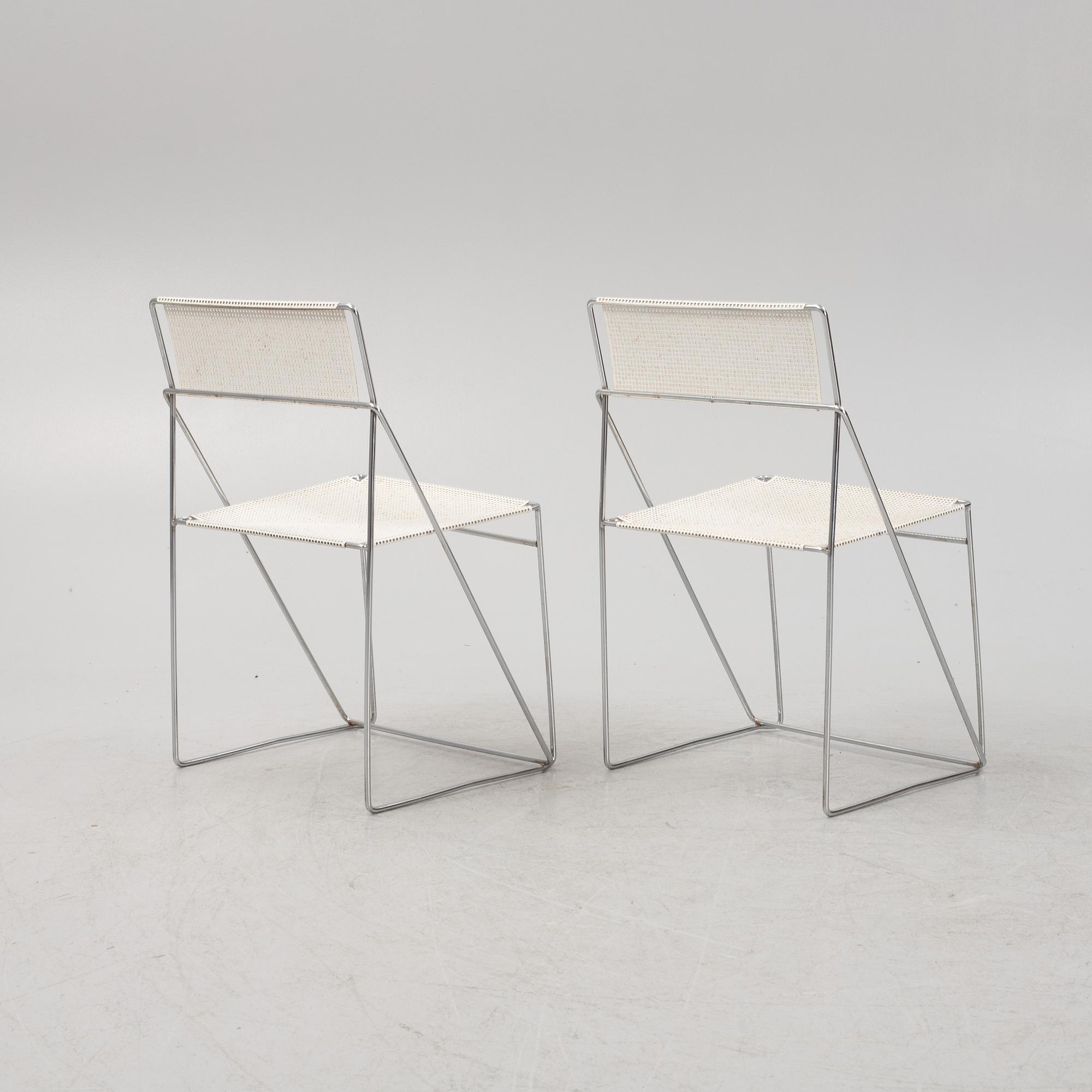 Nils Jörgen Haugesen, a pair of 'X-Line' chairs, Hybodan, Denmark, the model designed in 1977.