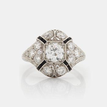 491. A platinum ring set with an old-cut diamond.