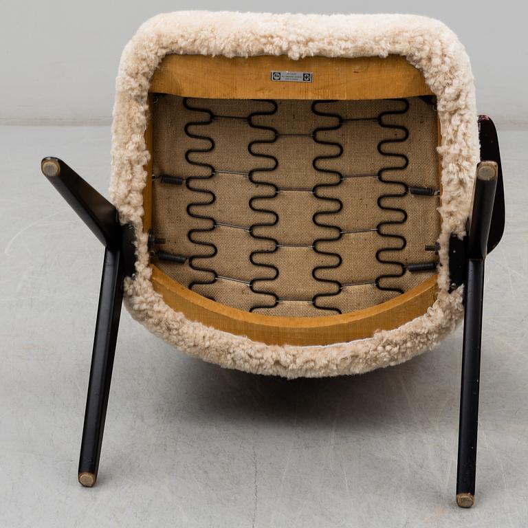A 1950's 'Triva' easy chair by Bengt Ruda, from Nordiska Kompaniet.