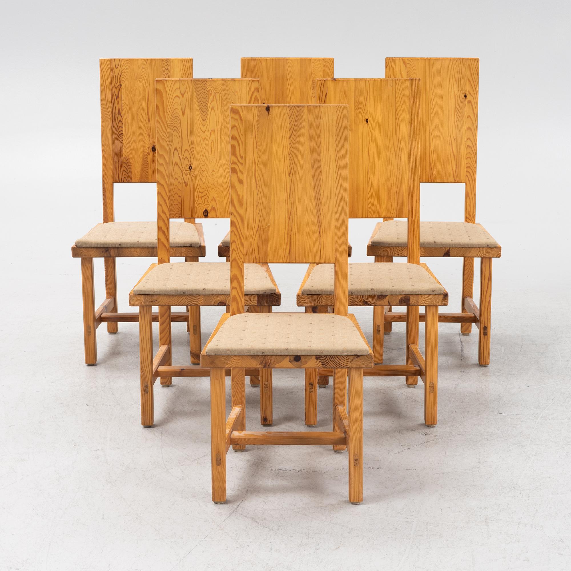 Göran Malmvall, a set of six chairs, Karl Andersson & Söner and a table, second half of the 20th Century.
