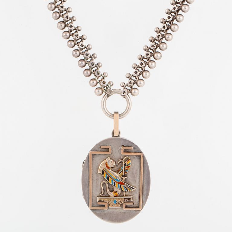 A LOCKET with partly silver and enamel.