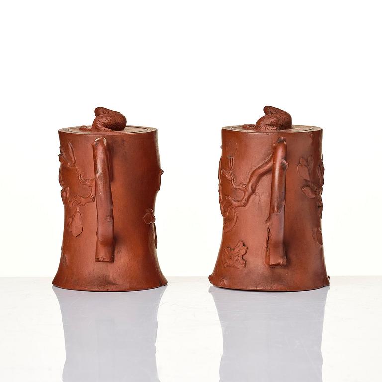 A pair of yixing teapots, Qing dynasty.