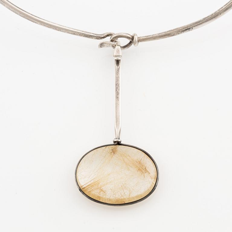 Vivianna Torun Bülow-Hübe, a necklace, silver, with a rutilated quartz pendant. Georg Jensen.