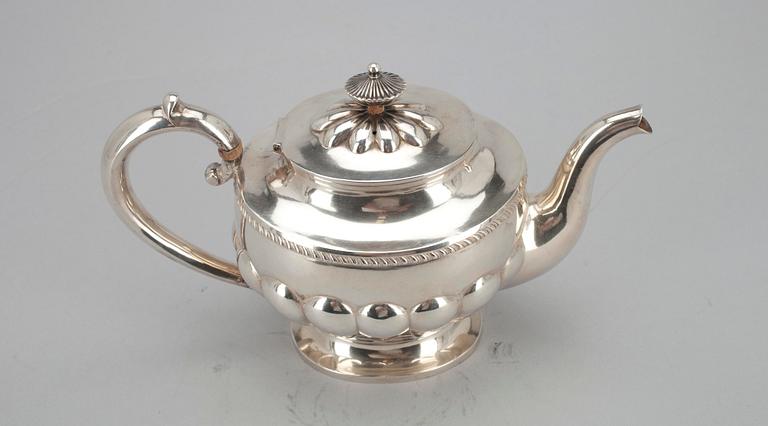 A russian silver teapot, St Petersburg 1893. Marked HK.