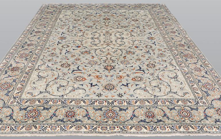 A carpet, Kashan, signed, ca 404 x 280 cm.