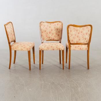 A 1950/60's dining table and chairs.