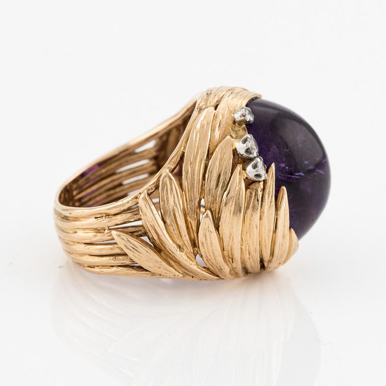 A ring in 18K gold with an amethyst designed by Barbro Littmarck, W.A. Bolin Stockholm 1971.