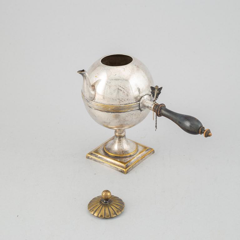 An Empire 19th century silvered brass teapot.