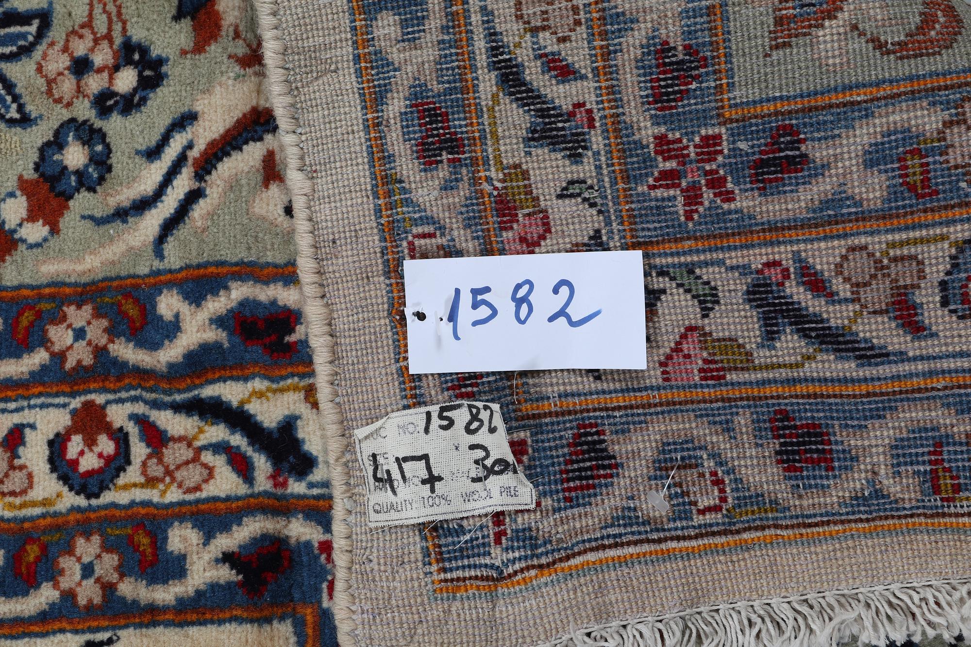 A carpet, Kashan, ca 417 x 300 cm.